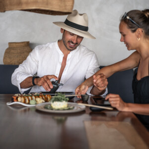 Pasaji Mykonos Restaurant Couple eating sushi